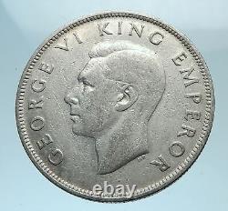 1942 NOUVELLE-ZÉLANDE sous le règne du roi George VI du Royaume-Uni, pièce d'argent de 1/2 couronne avec blason.