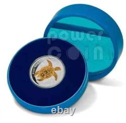 2010 Taku 2 $ - Tortue imbriquée pièce en argent dorée de 1 oz - Boîte liquide - SANS réserve