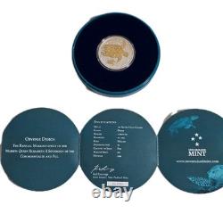 2012 1 oz Fiji Taku plaqué or. Pièce en argent 999 proof avec certificat d’authenticité et emballage d’origine de la Monnaie