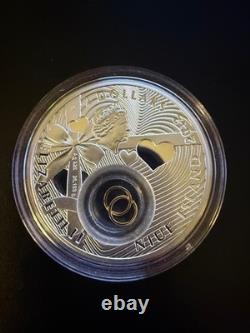 2012 Niue 2 $ pièce de mariage en argent sterling proof avec anneaux en or