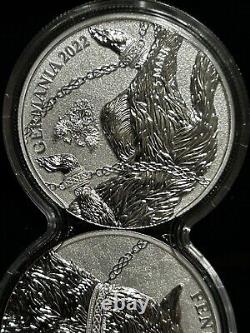 En français, cela se traduirait par : Ensemble de pièces de monnaie Germania Beasts Fenrir 2 x 1 oz. en argent 9999 BU de 2022 avec capsule duo.