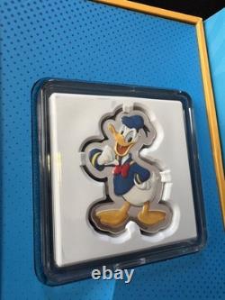 Monnaies en argent colorisées en forme de Mickey et ses amis de la Monnaie de Nouvelle-Zélande 2021, 1 oz