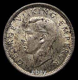 Pièce d'argent de six pences de Nouvelle-Zélande UNC 1943 du roi George VI / Oiseau Huia n° 0803.