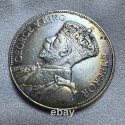 Pièce de 1 florin des Fidji de 1934 en argent, patine irisée arc-en-ciel aux reflets huileux sur le pourtour, non circulée (UNC), rare Pièce de 1 florin des Fidji de 1934 en argent, patine irisée arc-en-ciel aux reflets huileux sur le pourtour, non circulée (UNC), rare