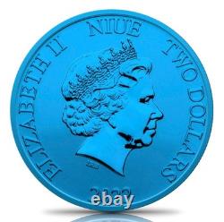 Pièce en argent colorisée de 1 oz représentant une tortue de Nouvelle-Zélande, couleur bleue spatiale, avec boîte et certificat d'authenticité.