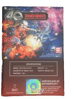 Transformers 40 ans 2024 pièce argentée poster 1 oz #203 / 1 984